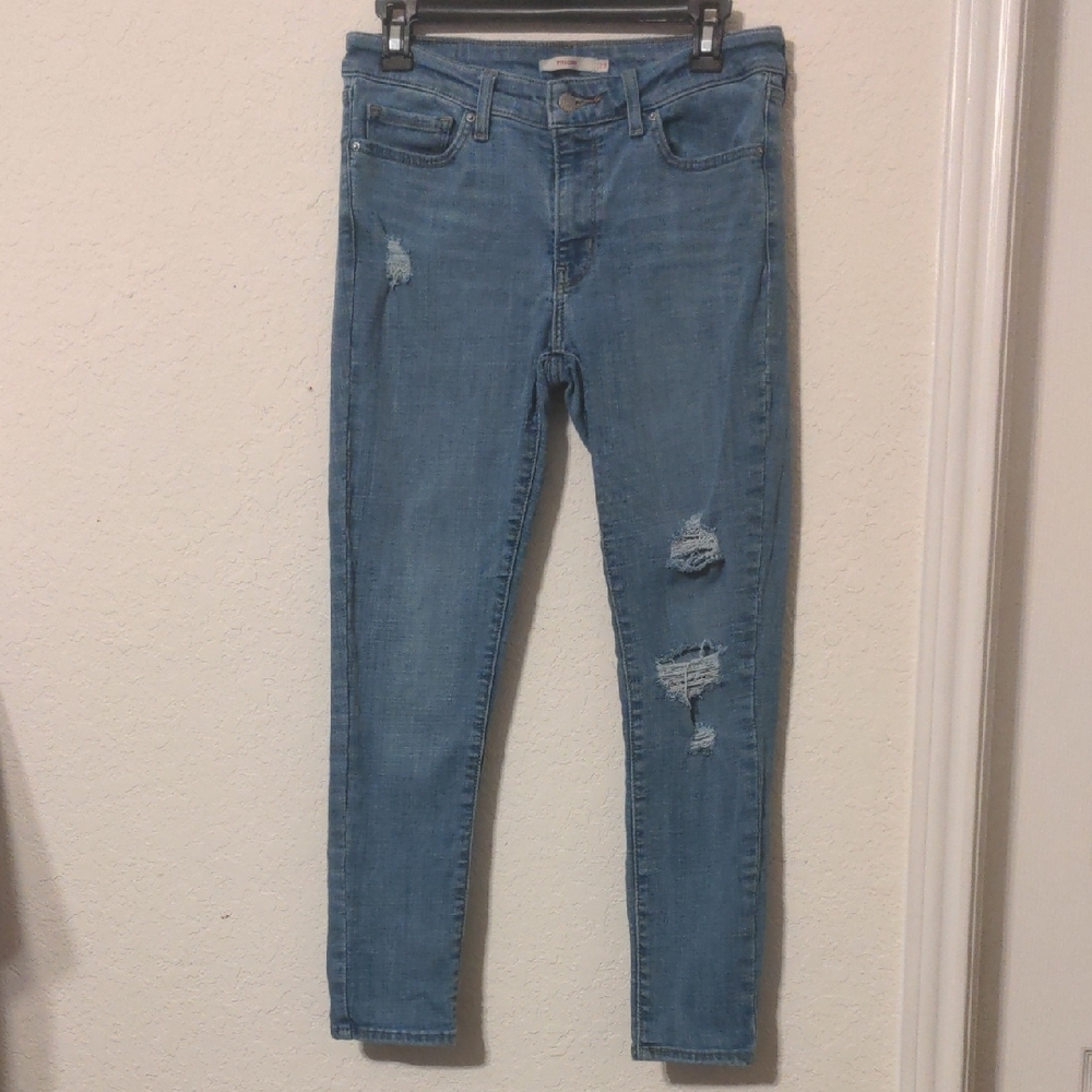 Levi Strauss 711 Skinny Women's Mid Rise Blue Distressed Jeans. Size 28
